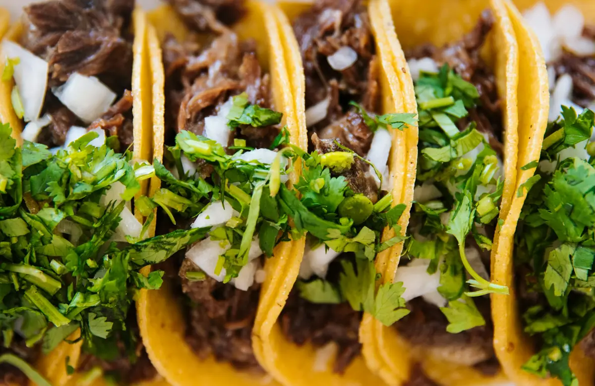 Mexican restaurant dish, tacos with fresh toppings